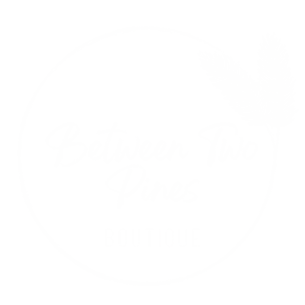 betweentwopinesboutique logo